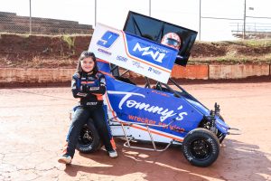 Estela Smiling out of car