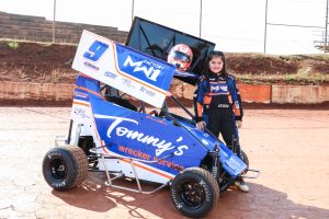 Estela out of car - with helmet